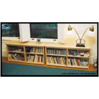 Bungalow bookcases with birds eye maple tops. Designed for economy of material and the low window stool and apron in an Arts and Crafts home.