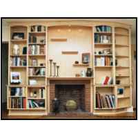 Maple fireplace surround with bookshelves and floating display shelves, features low voltage halogen recessed lighting
