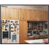 Natural maple raised panel kitchen. Uninstalled, refinished and reinstalled after an oak tree fell on the kitchen courtesy of hurricane Fran.