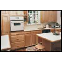 Natural maple raised panel kitchen. Uninstalled, refinished and reinstalled after an oak tree fell on the kitchen courtesy of hurricane Fran.