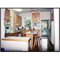 Natural maple raised panel kitchen. Uninstalled, refinished and reinstalled after an oak tree fell on the kitchen courtesy of hurricane Fran.